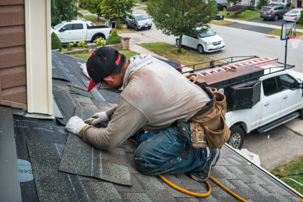Professional Flat Roof Repair technician working in Callender, IA